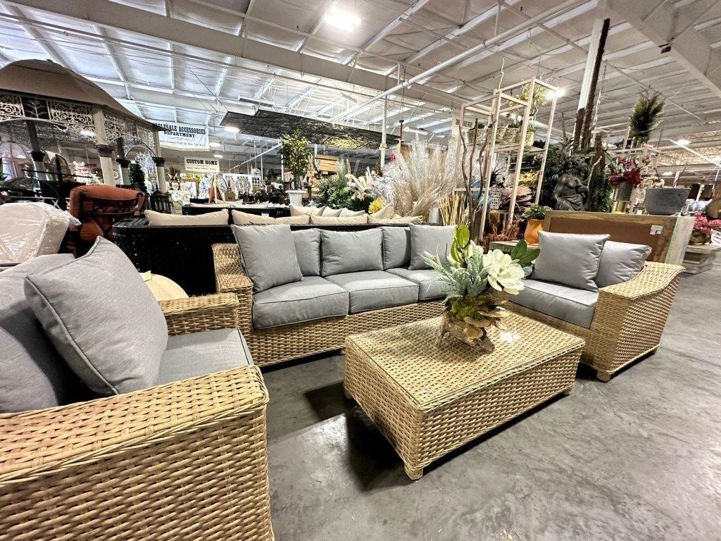 Gray wicker furniture set photographed on the World of Decor warehouse floor