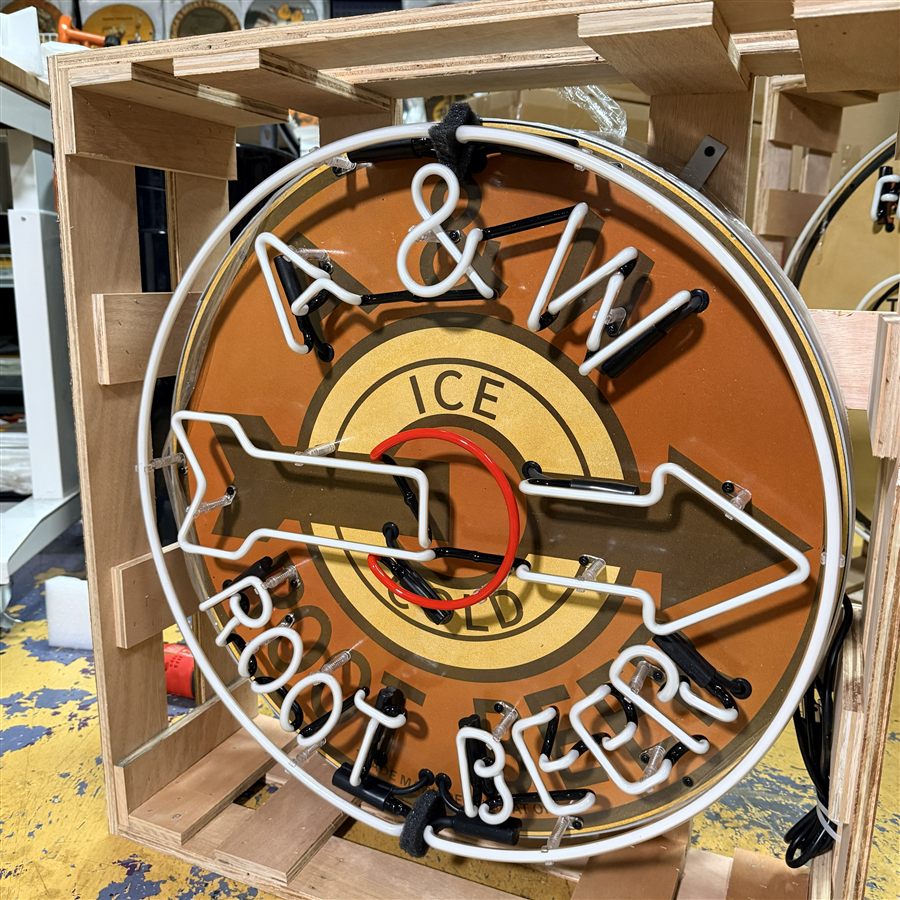 Modern reproduction A and W-branded neon display photographed in a wood frame