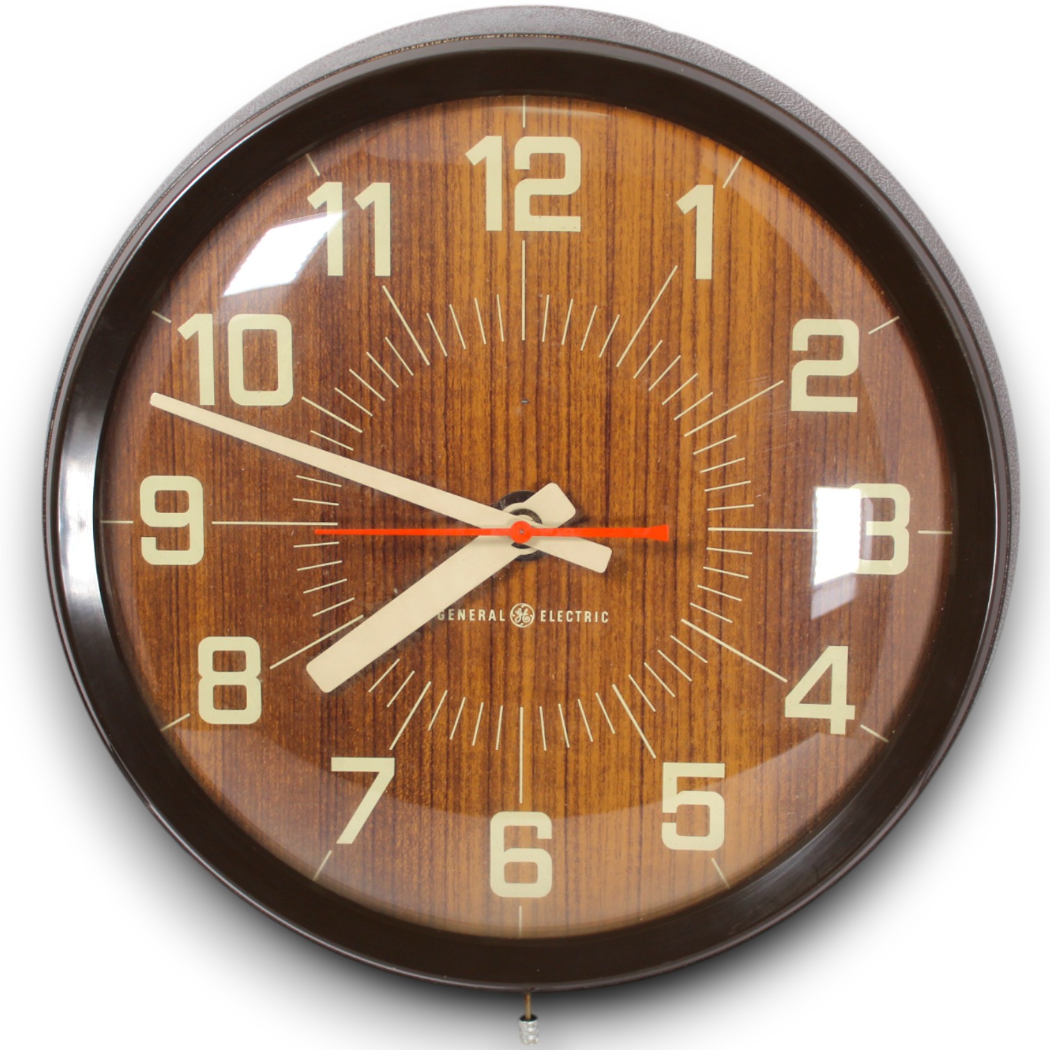Wall clock photographed straight on for an online auction catalog