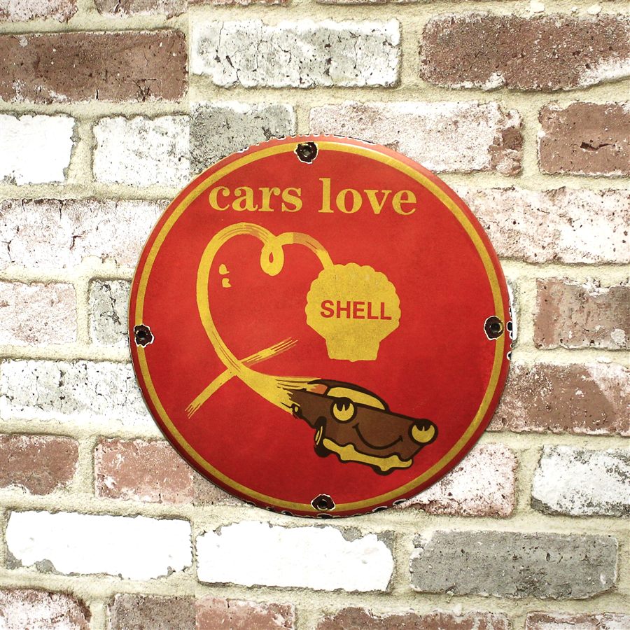 Modern reproduction Shell-branded porcelain sign photographed for an auction catalog